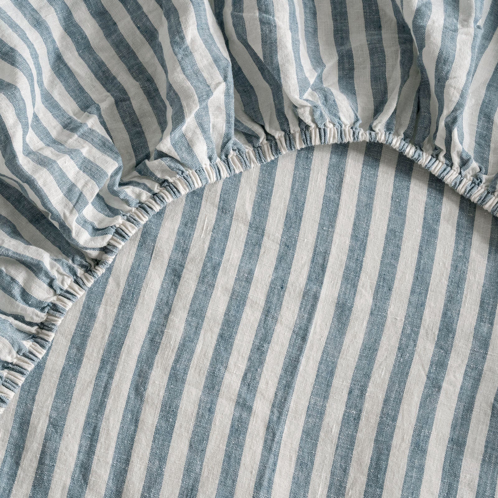 French Flax Linen Fitted Sheet in Marine Blue Stripe - Image 6